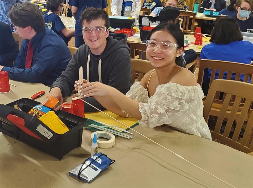 NA students Hayden B. & Yuki Q. compete in the technology problem-solving event at the Technology Student Association.