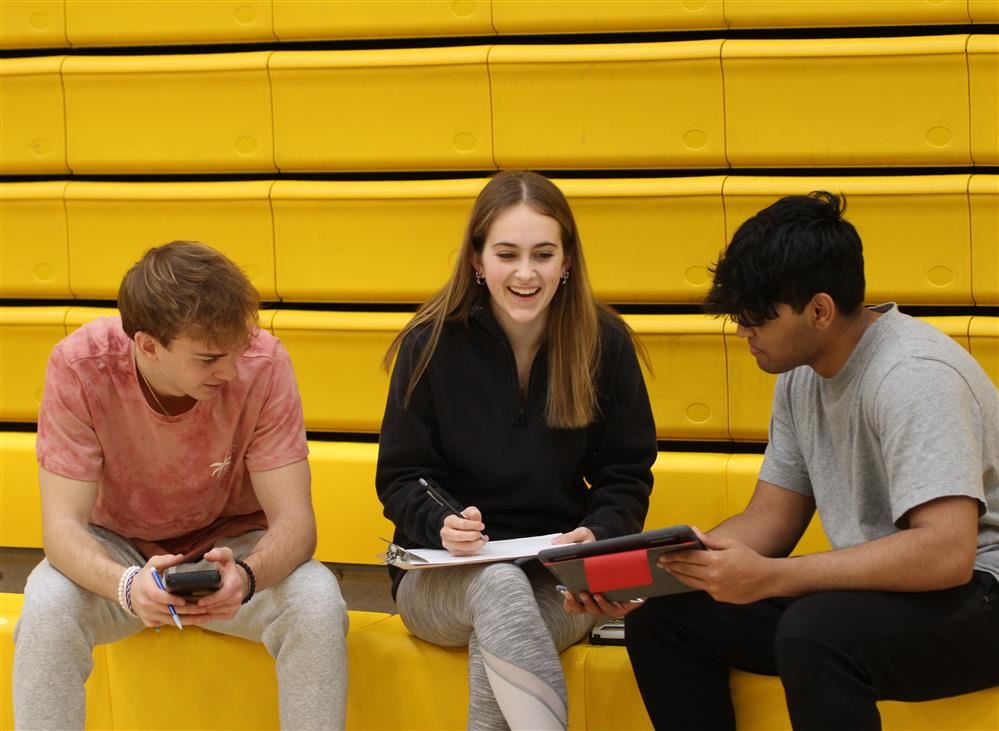 NASH students Ryan, Emma, & Mohit act as pilots, using trigonometry to determine a flight path.